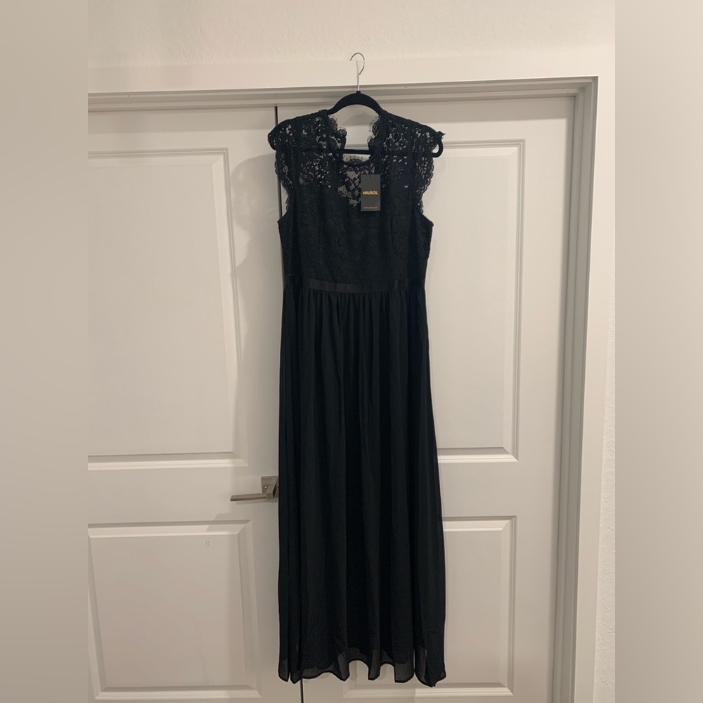 Pretty lace top evening dress. Floor length, zipper back closure . Never worn.
